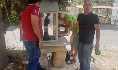 شباب عنقون يعيدون اصلاح الاضرار في احد المزارات في مغدوشة