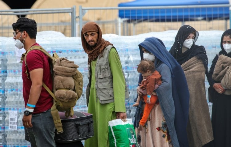 بالصور: قاعدة رامشتاين الأميركية في ألمانيا تتحول إلى مخيم للاجئين من أفغانستان
