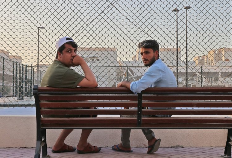 لاجئون أفغان يقيمون في مقر كأس العالم لكرة القدم في قطر
