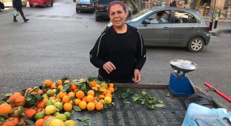 بائعة برتقال تجوب بيروت.. "لطيفة" تبحث عن رزقها بمهنة رجالية