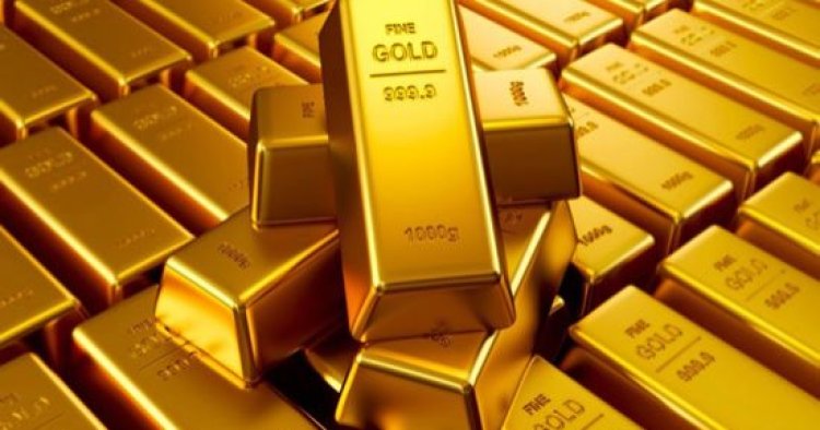الذهب انخفض مع صعود الدولار بعد رفع الفائدة الأميركية